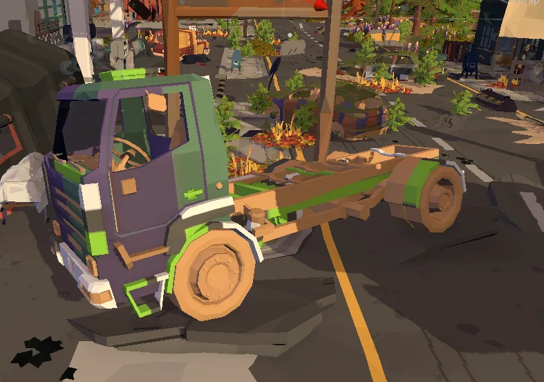 A delivery truck stretched and broken apart on a street.